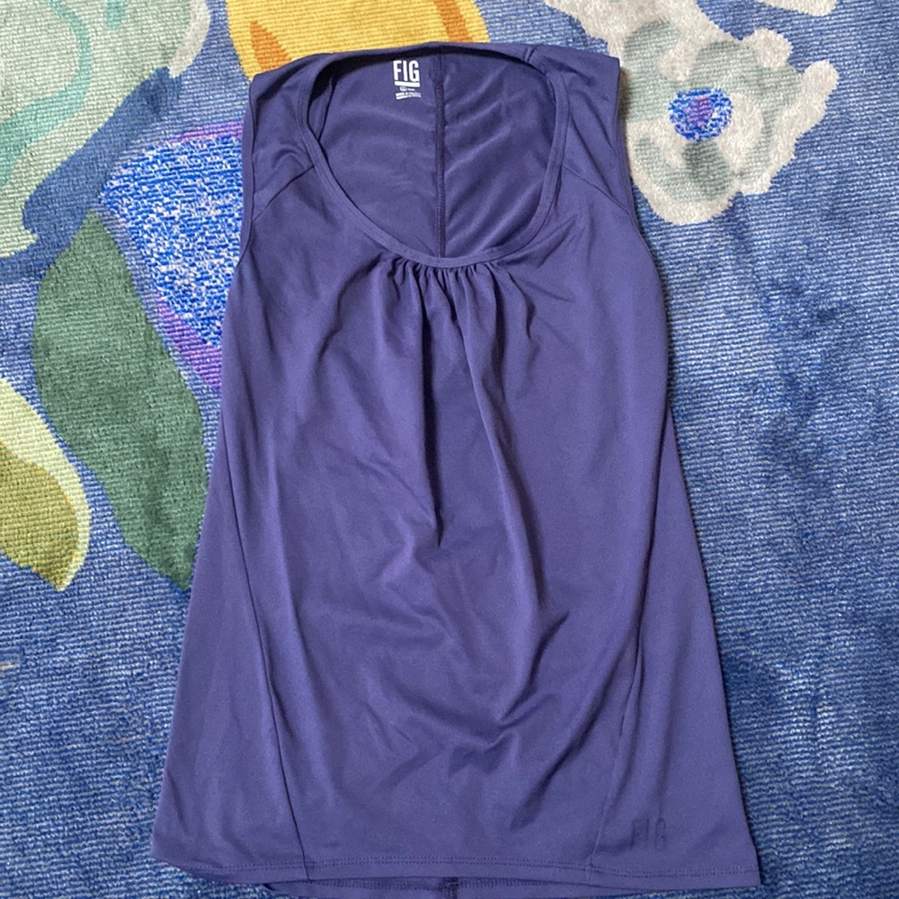 Never worn mint condition Fig tank